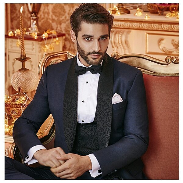 Enhance every moment by donning this suave tuxedo from our Handcrafted Ceremonial collection. Book an appointment today at http://bit.ly/TASBookAnAppointment

Stylist: @nikhilmansata
Creative Director: @prashish_moore 
Model: @samifalktaha 
#TheArvindStores #MadeInArvind #CeremonialCollection #WeddingCollection #CollectionForMen #TraditionalWear #NewCollection #Fashion #FashionForMen #CeremonyWear #Style #StyleStatement